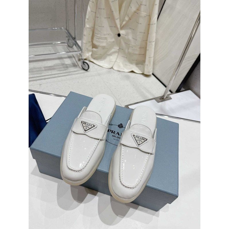 Pra*a patent leather mule sandals white