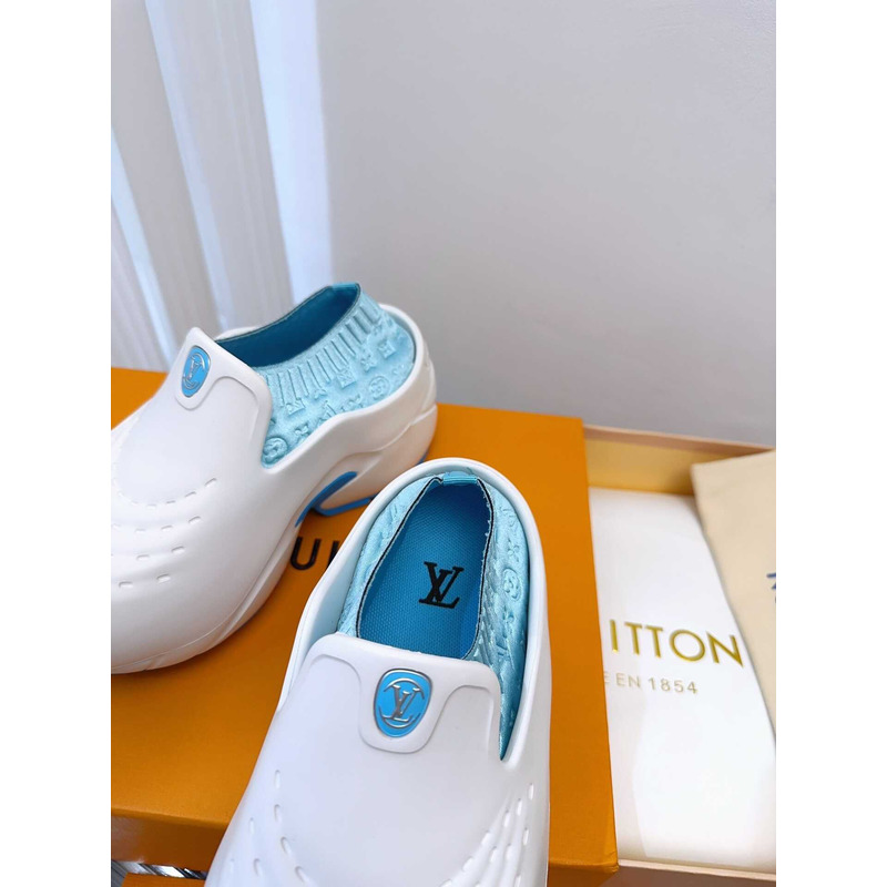 l**is V*t*n foam clogs blue and white