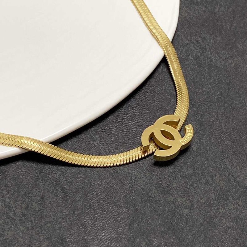 Ch*el snake bone necklace gold