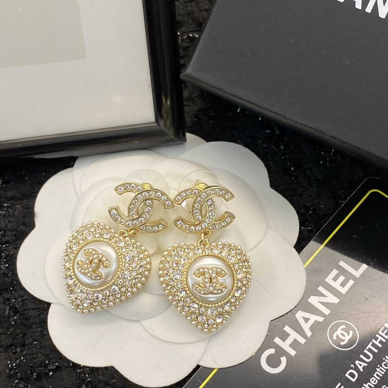 Ch*el cc heart gold tone and crystal earrings