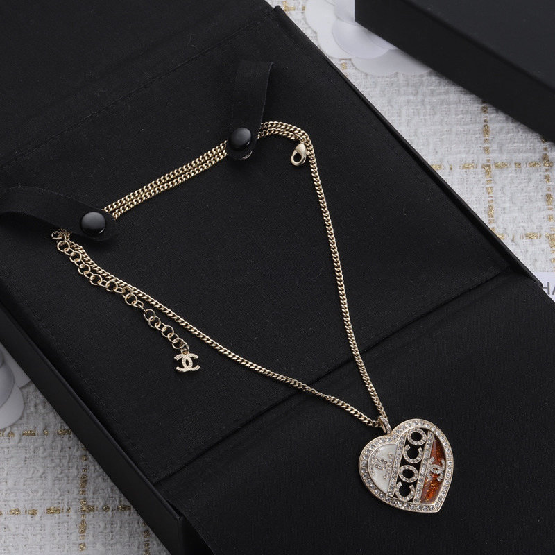 Ch*el pendant metal and crystal necklace