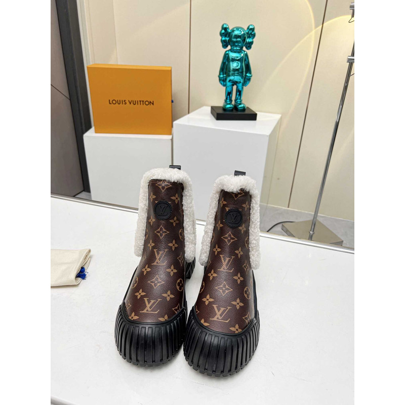 l**is V*t*n ski ruby flat ankle boot monogram