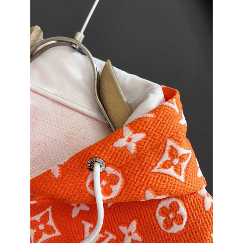 l**is V*t*n hoodie and pants orange