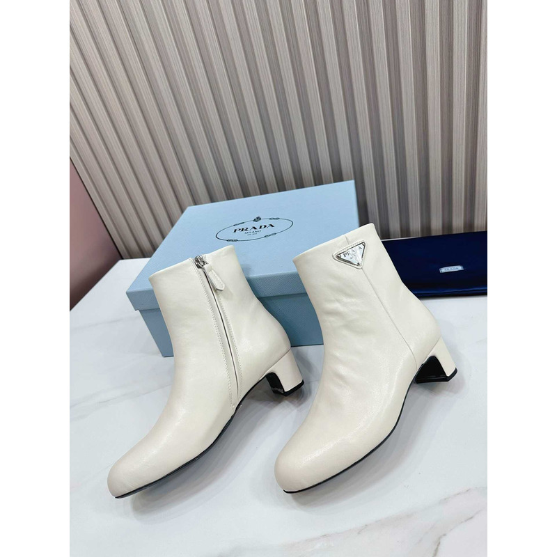 Pra*a leather ankle boots white