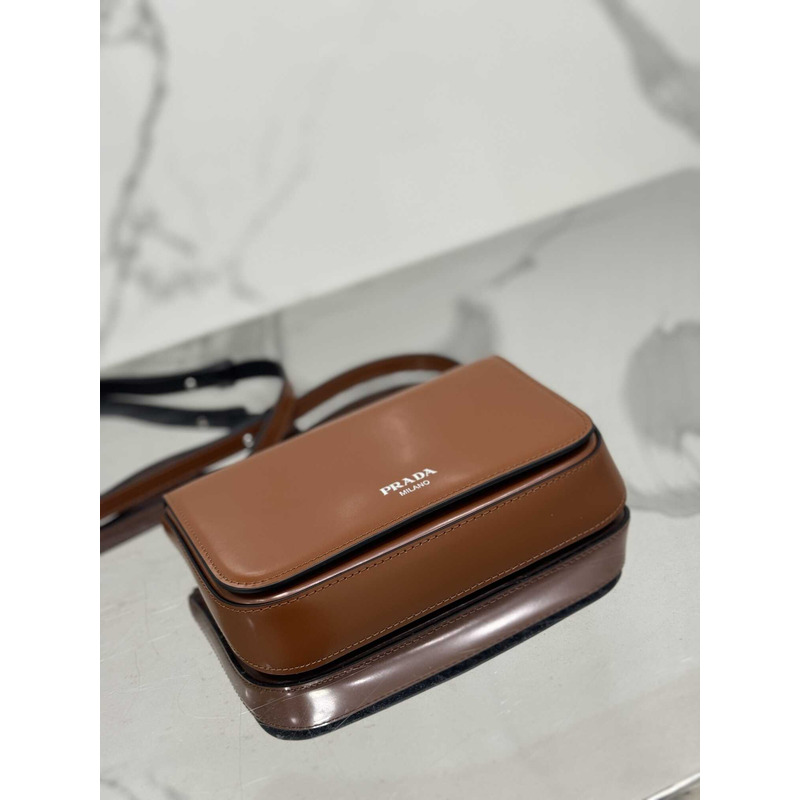 Pra*a brushed leather mini-bag with shoulder strap  brown