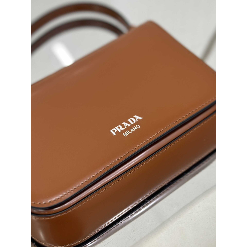 Pra*a brushed leather mini-bag with shoulder strap  brown