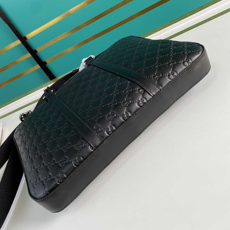 g*u*i gg S*p*e embossed leather briefcase black