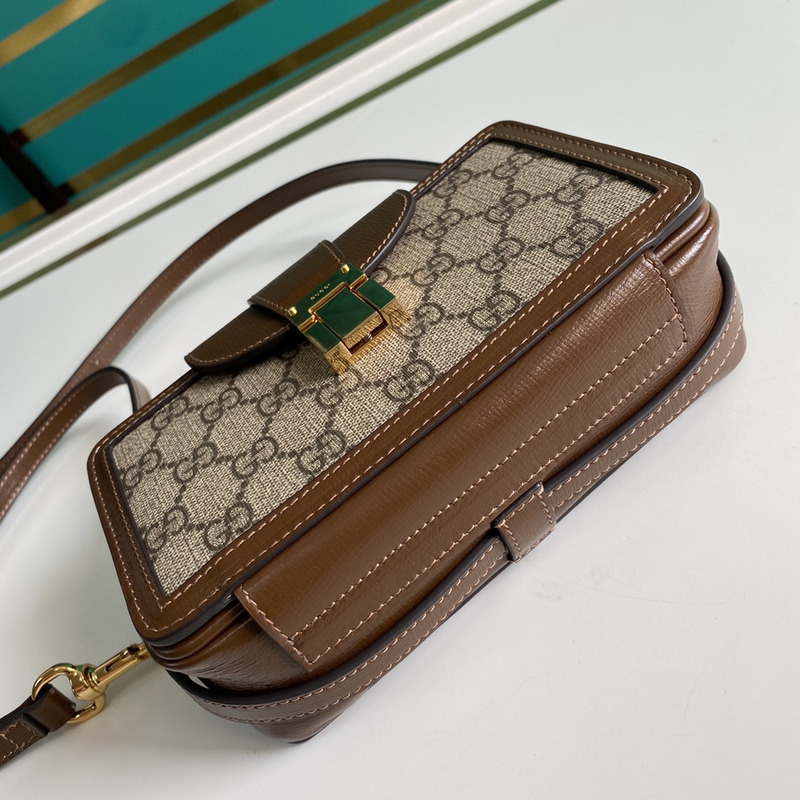 g*u*i gg S*p*e mini bag with clasp closure brown