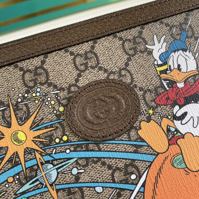 G*u*i x disney donald duck zip holder