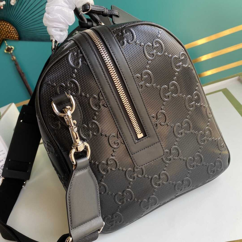 G*u*i gg embossed duffle bag black