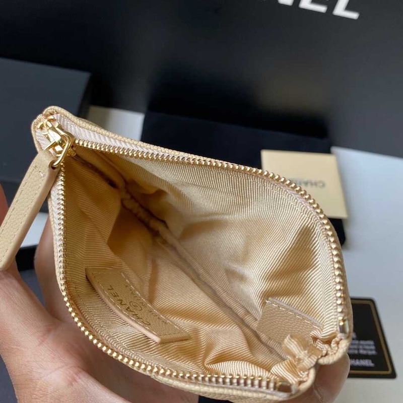 Ch*el Ch*el caviar quilted zipped key holder case beige