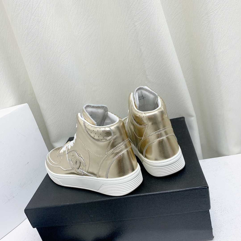 Ch*el trianers high top gold