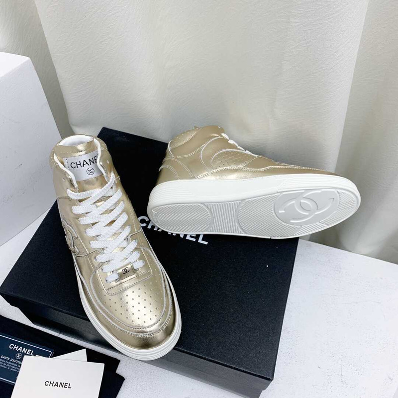 Ch*el trianers high top gold
