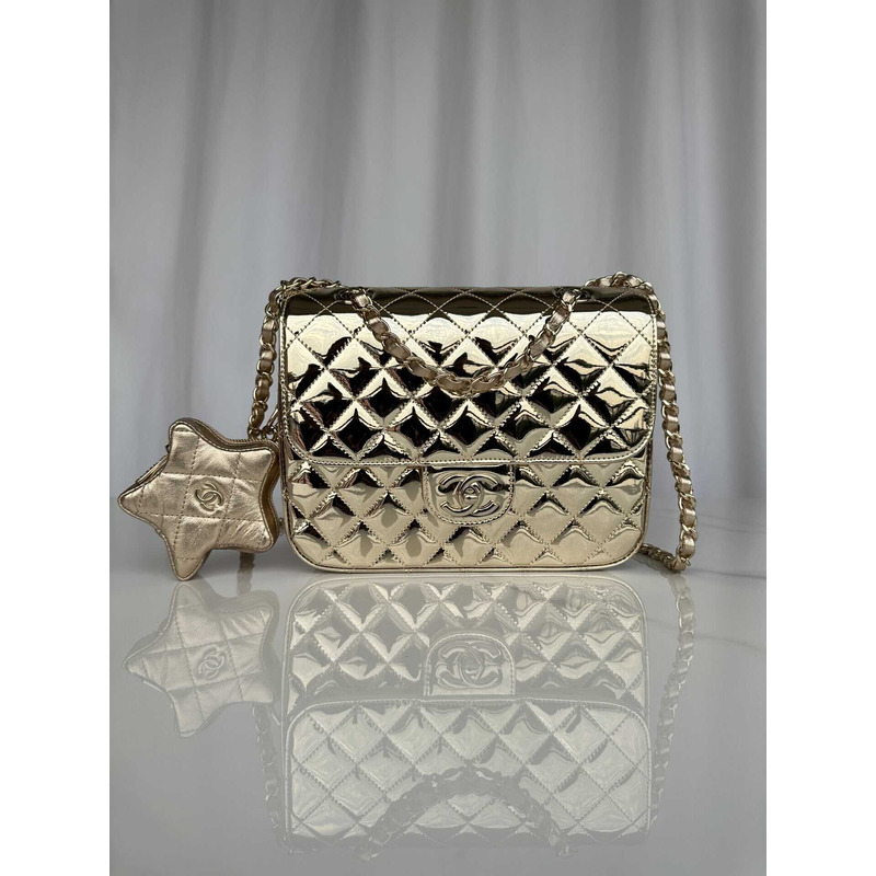 Ch*el backpack & star coin purse metallic mirror calfskin, metallic lambskin & gold-tone metal light gold