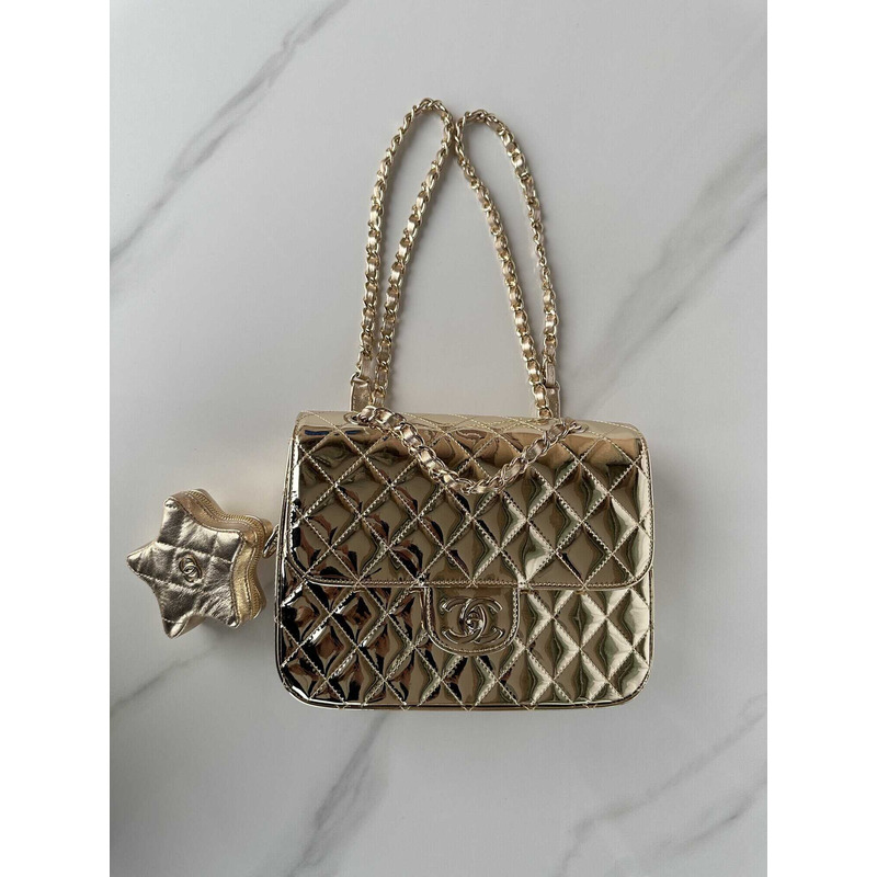 Ch*el backpack & star coin purse metallic mirror calfskin, metallic lambskin & gold-tone metal light gold