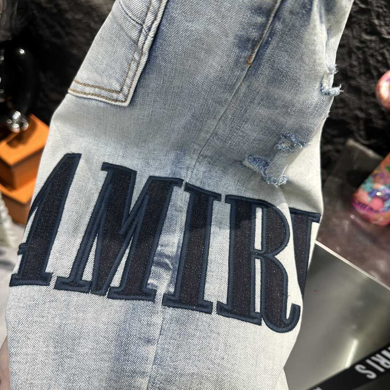 Amiri Logo Distressed Skinny Jeans Blue