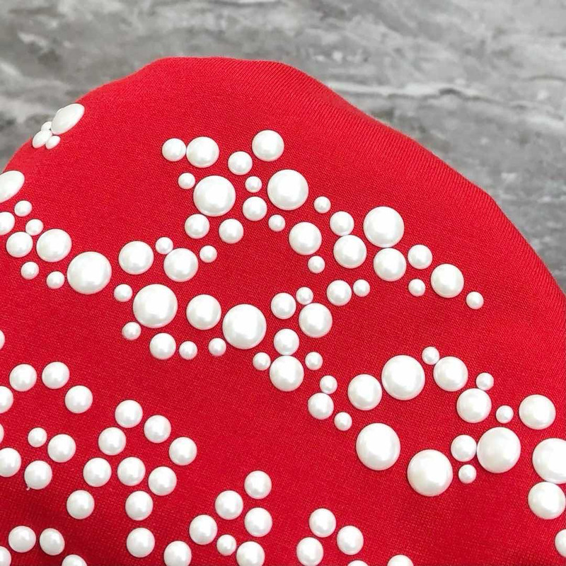 l**is V*t*n t-shirt red calligraphy and a violin case