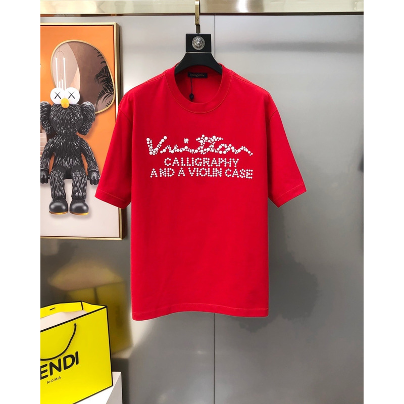 l**is V*t*n t-shirt red calligraphy and a violin case