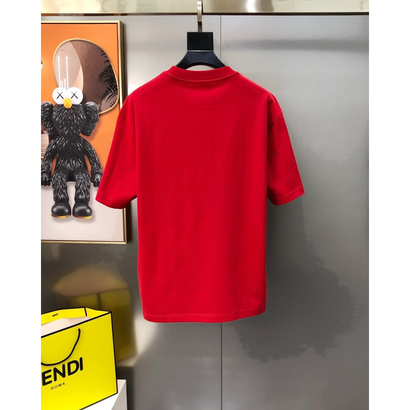 l**is V*t*n t-shirt red calligraphy and a violin case