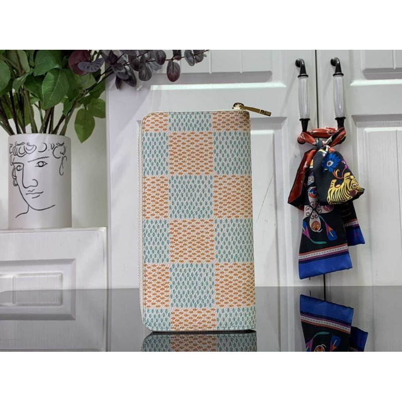 l**is V*t*n zippy wallet in muti color