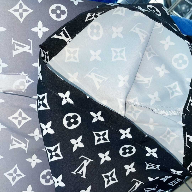 l**is V*t*n monogram shorts black/white