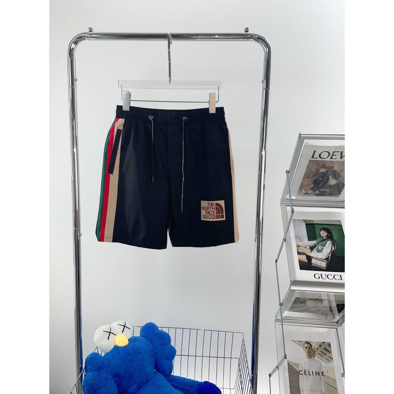 g*u*i x the n0*h F**e shorts black