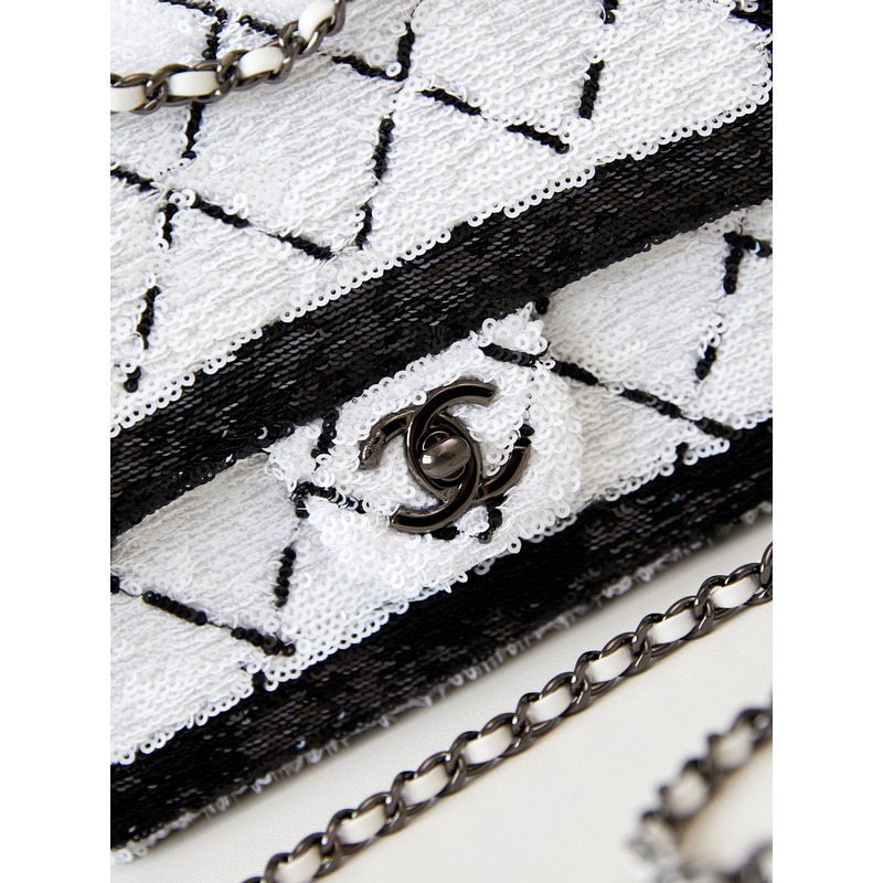 Ch*el large palatine capsule sequins & gold metal white and black