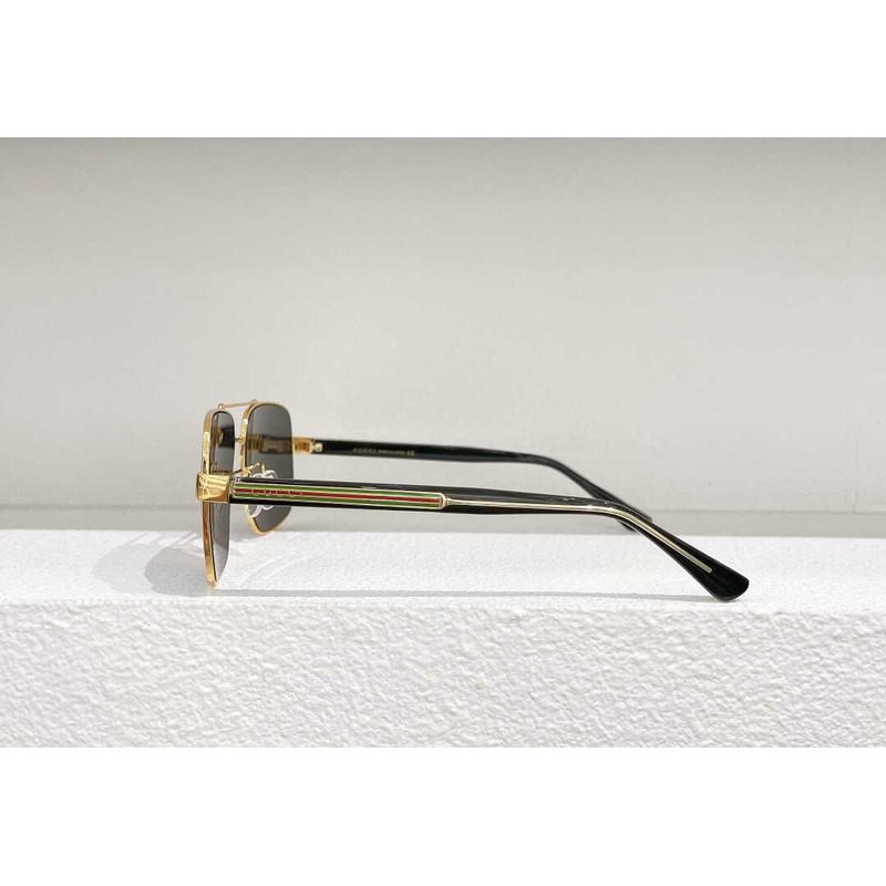 G*u*i sunglasses gold