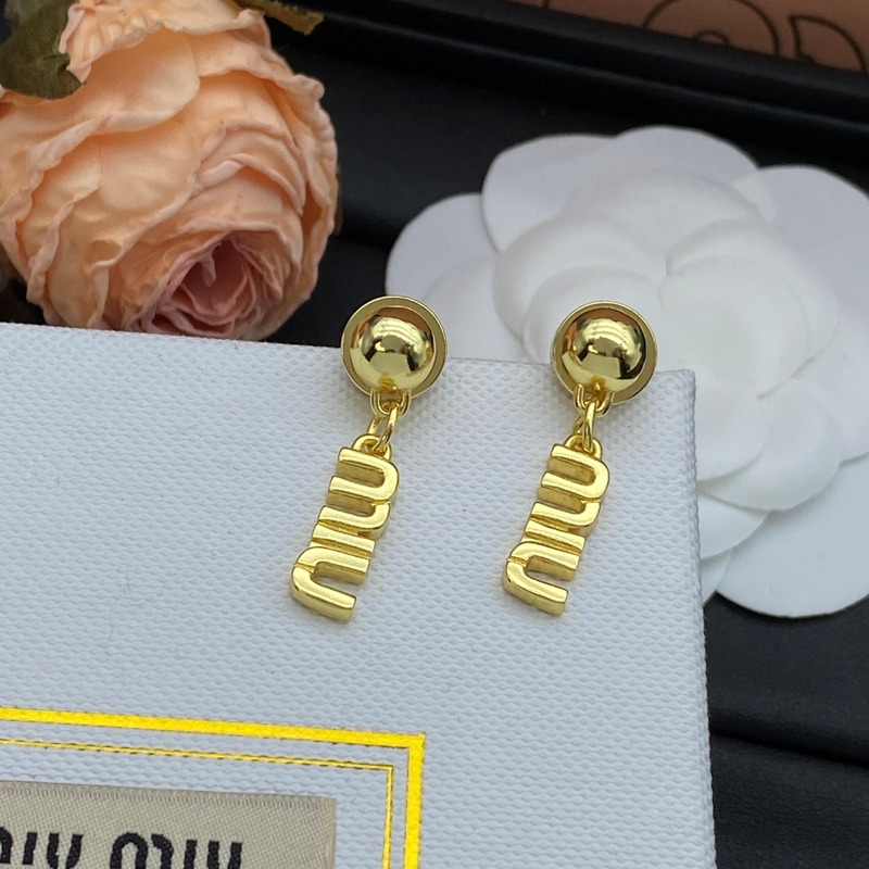 Miu Miu Ohrringe aus Metall Gold