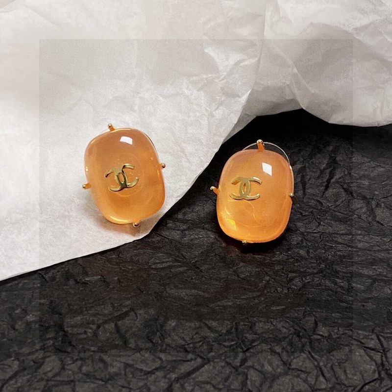 Ch*el cc logo earrings orange tone