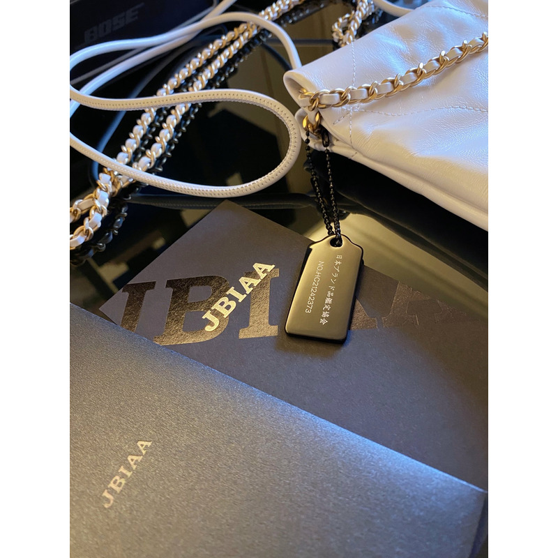 Ch*el shiny calfskin & gold-tone metal Ch*el 22 white