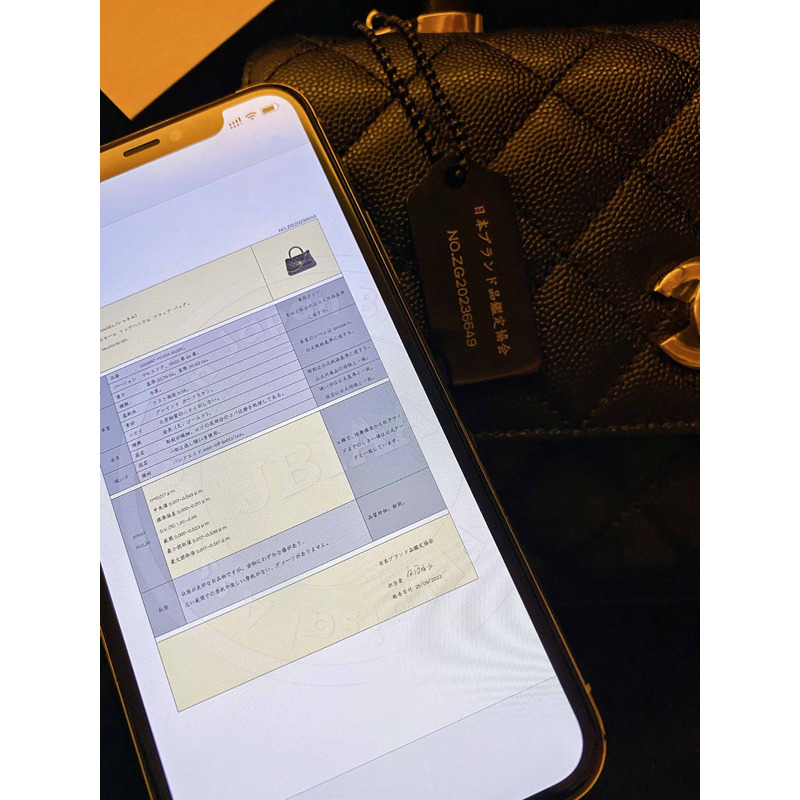 Ch*el flap bag with handle grained calfskin & gold-tone metal black