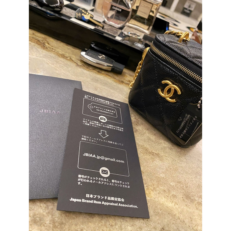 Ch*el quilted caviar mini vanity case gold hardware black