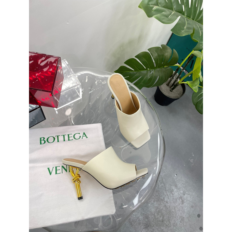 Bo*te*ga ve*ne*ta knot mule with gold finished metal knot heel beige