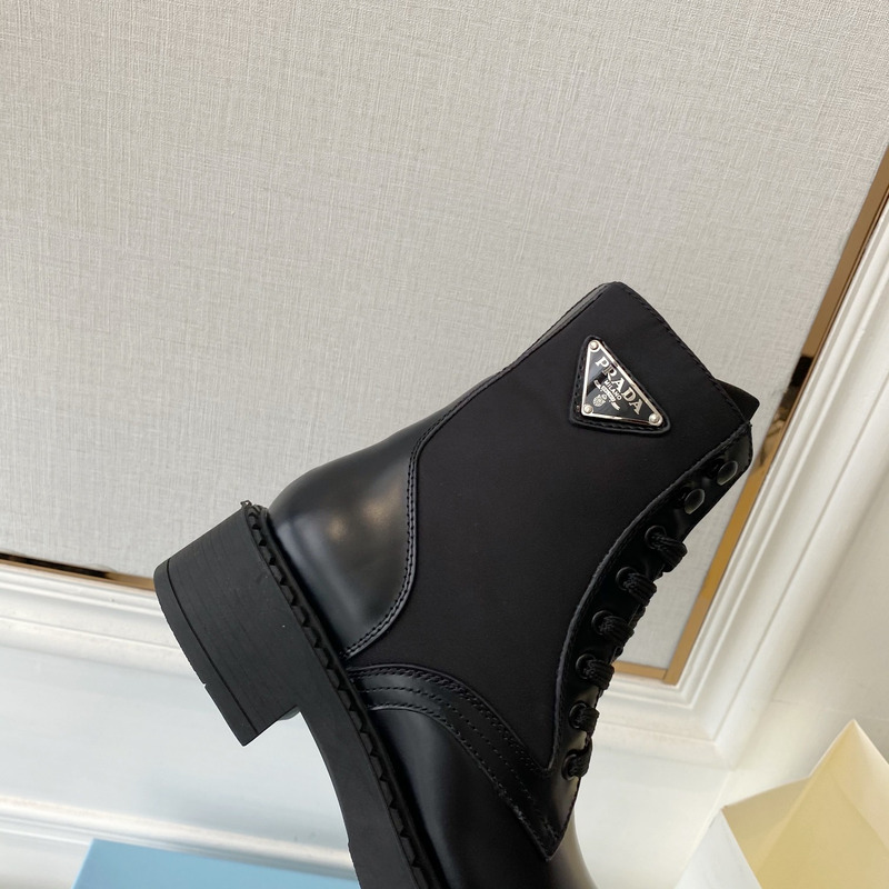 Pra*a brushed-leather and re-nylon boots black
