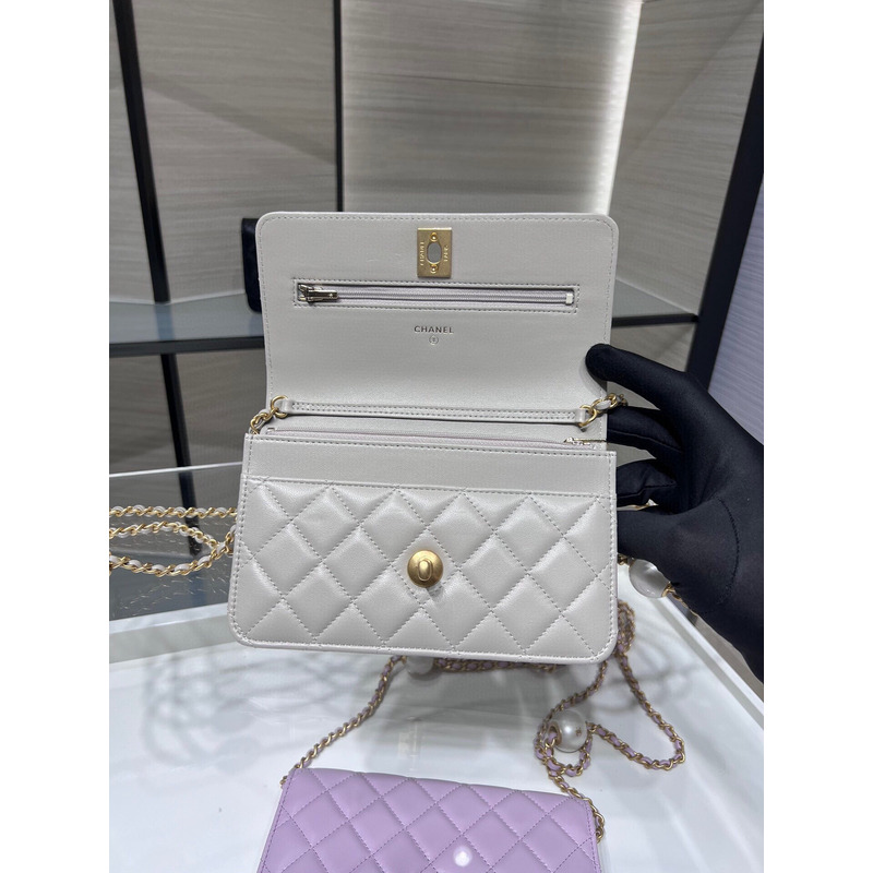 Ch*el lambskin, imitation pearls & gold metal in white