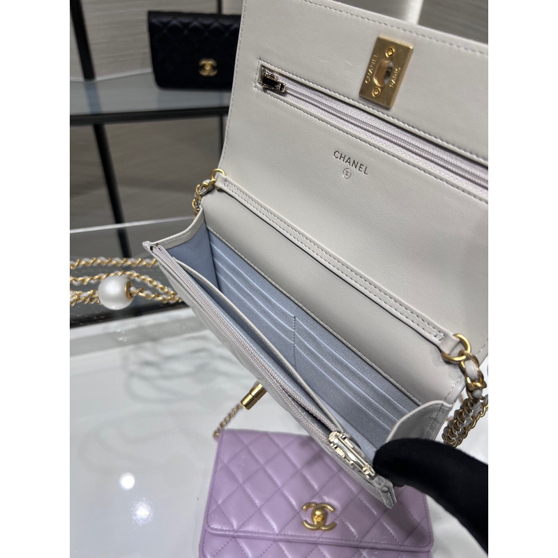 Ch*el lambskin, imitation pearls & gold metal in white