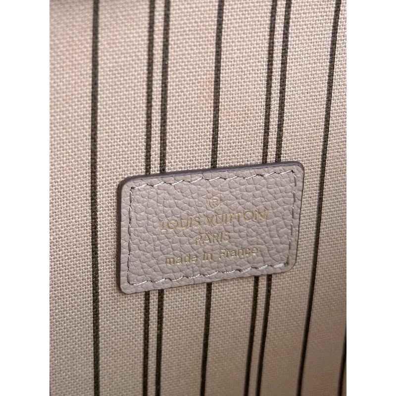 l**is V*t*n pochette métis monogram empreinte beige