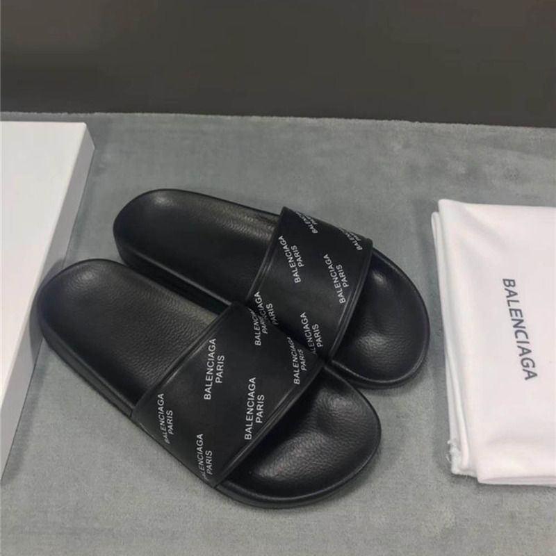 Ba*len*cia*ga allover logo-stamped pool slide sandal