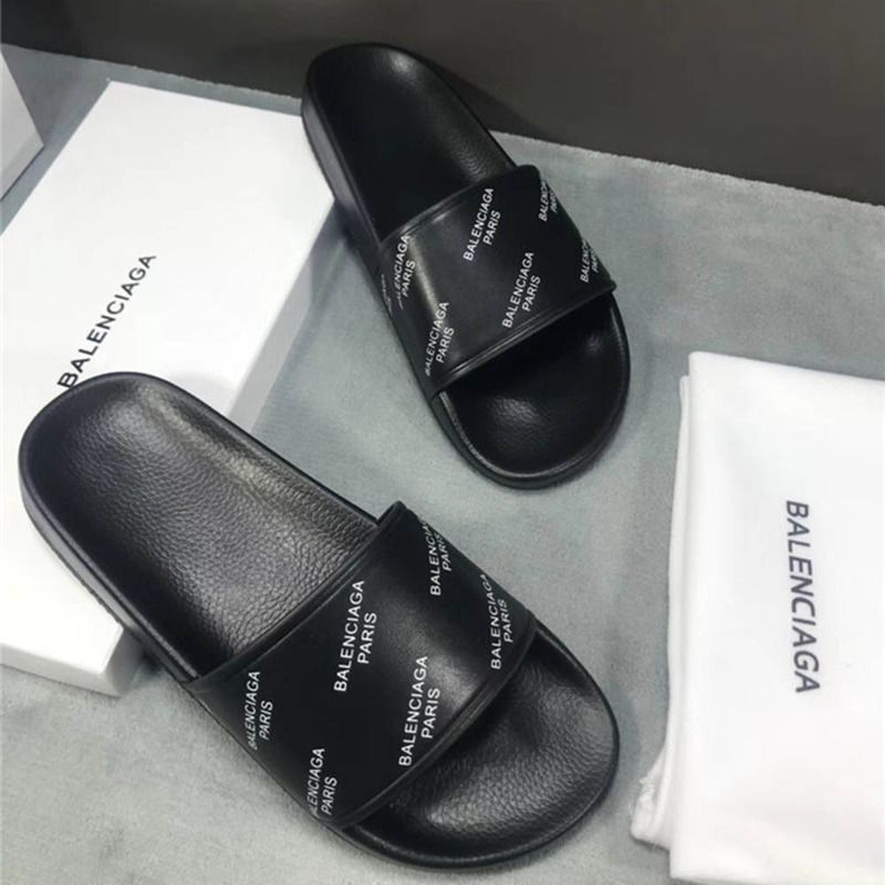 Ba*len*cia*ga allover logo-stamped pool slide sandal