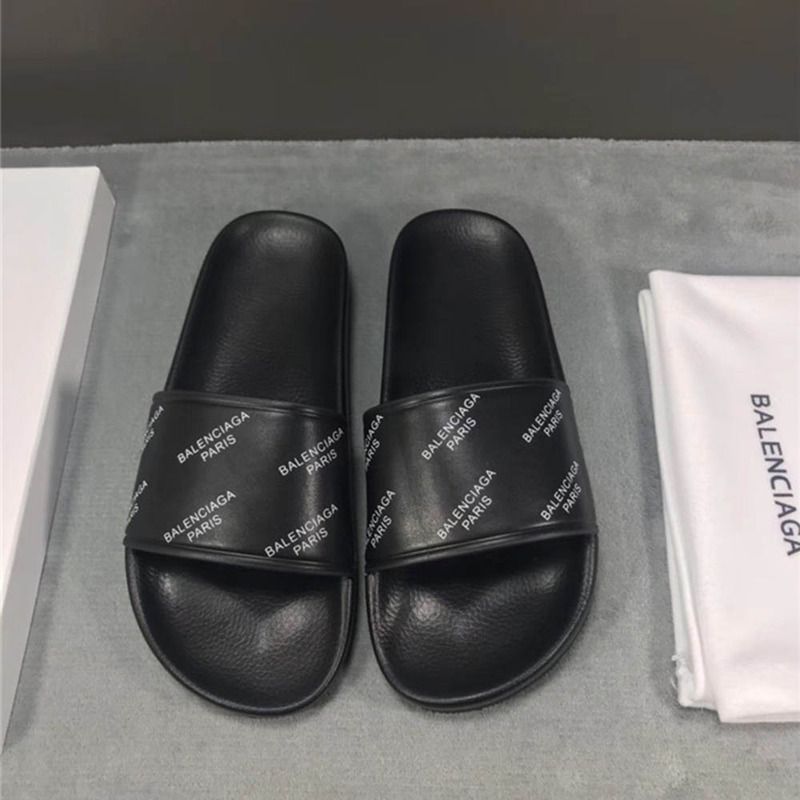 Ba*len*cia*ga allover logo-stamped pool slide sandal