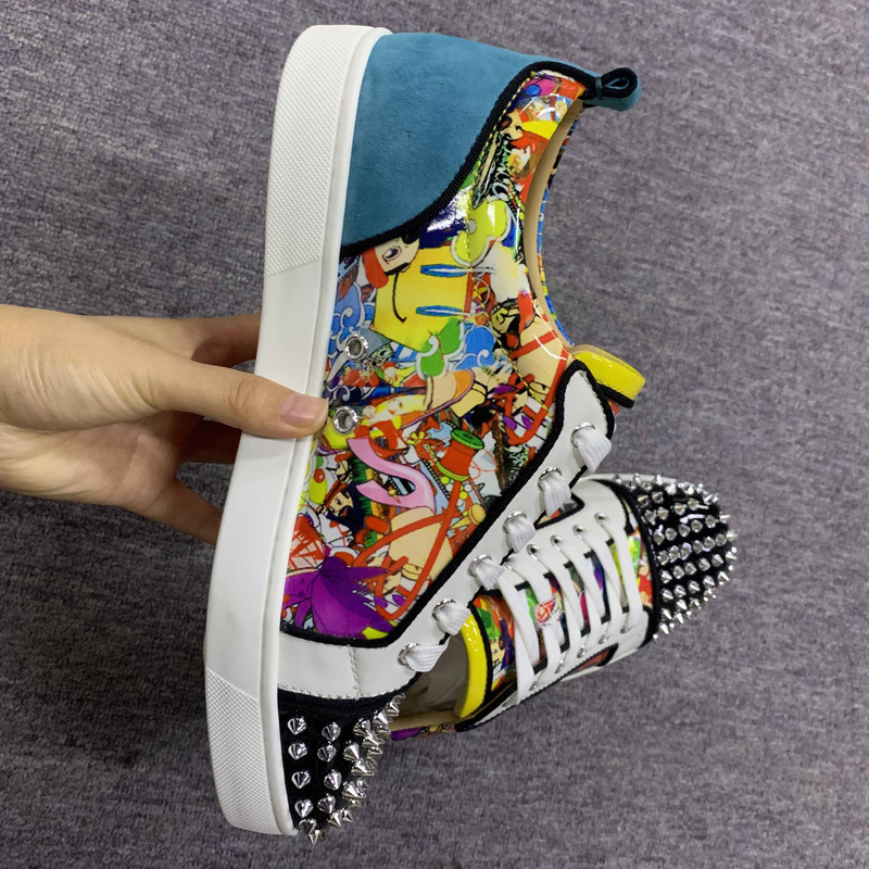 ch**an louboutin S*per perfect l**is junior spikes trainers