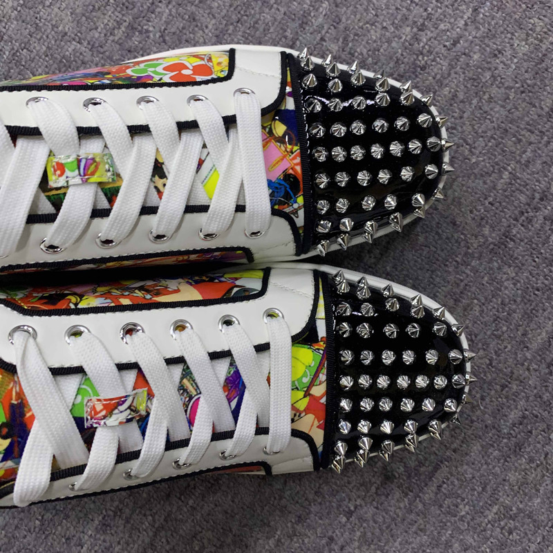 ch**an louboutin S*per perfect l**is junior spikes trainers