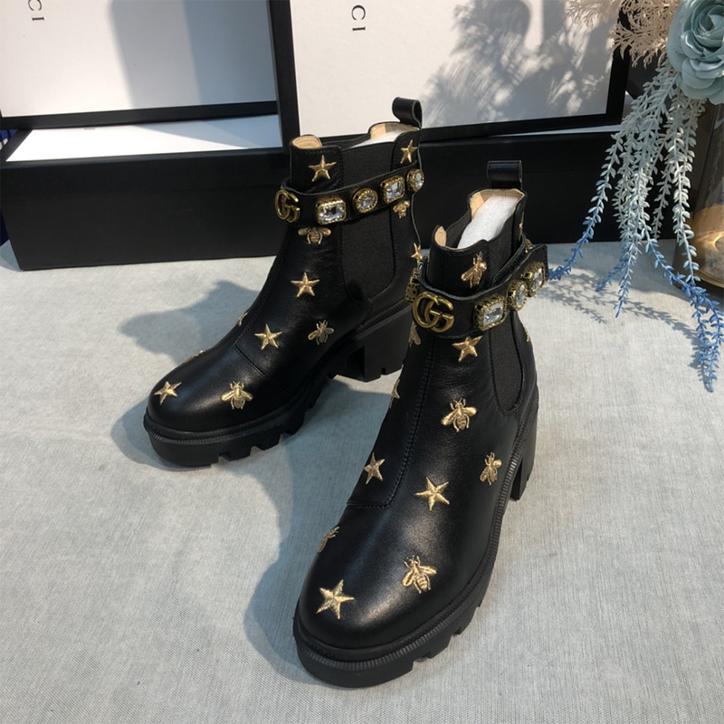 G*u*i embroidered leather ankle boot with belt