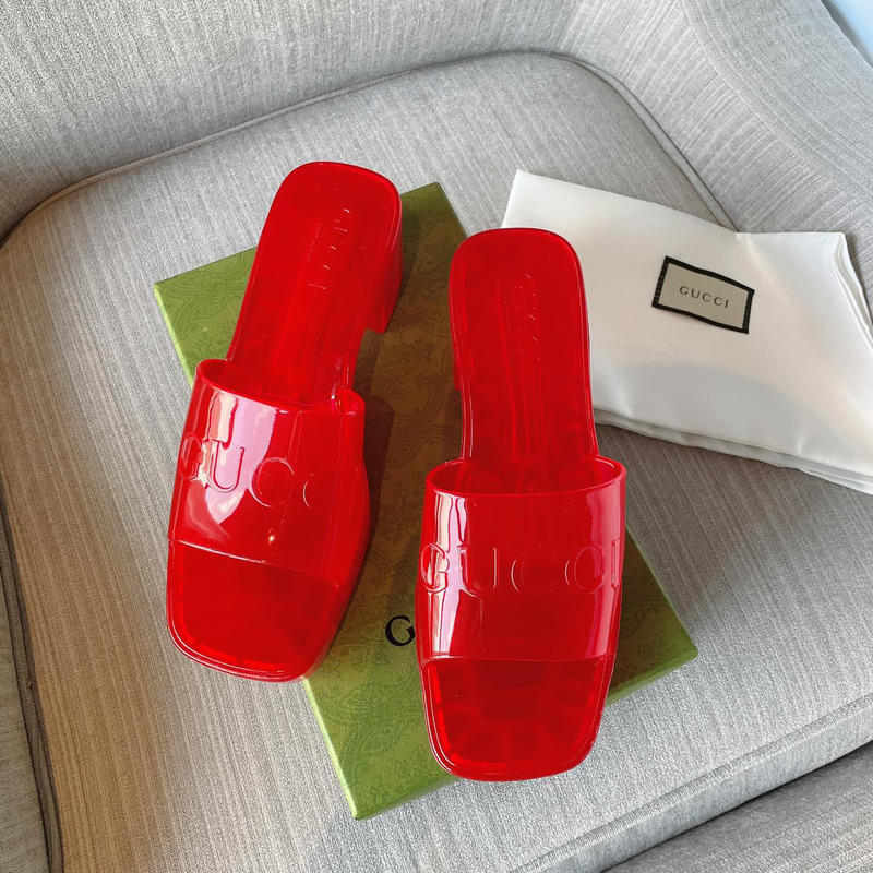 G*u*i plastique logo-embossed rubber mules