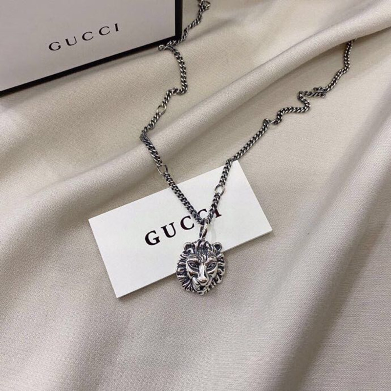 G*u*i 925 sterling silver lion head pendant