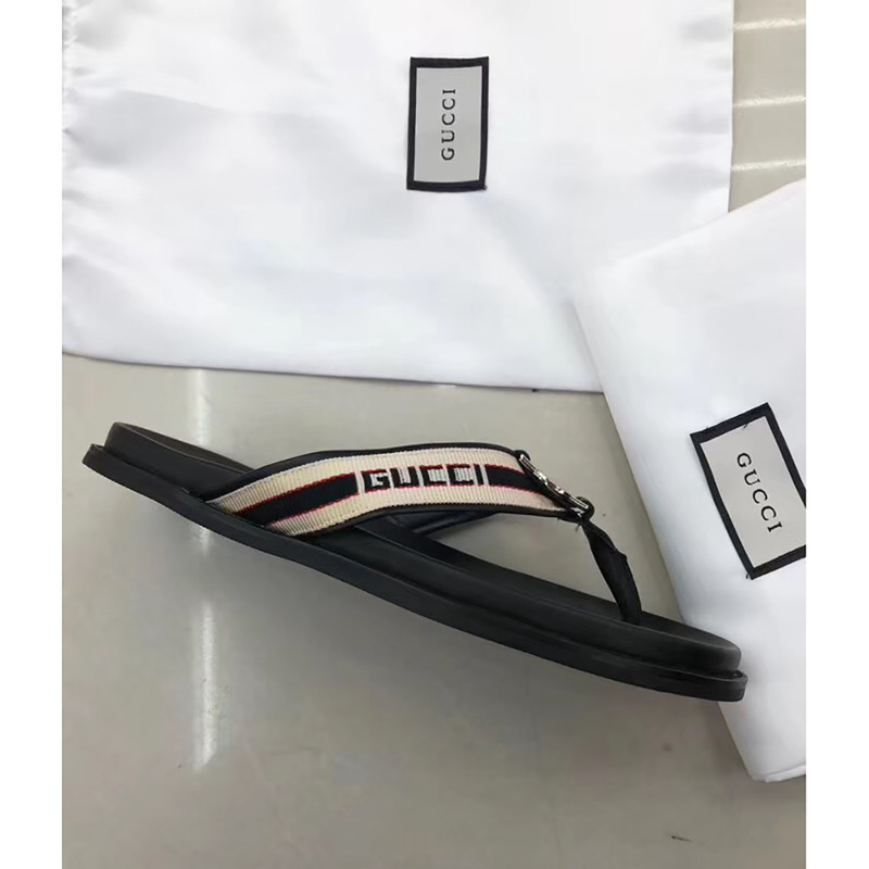 G*u*i web horsebit thong sandals