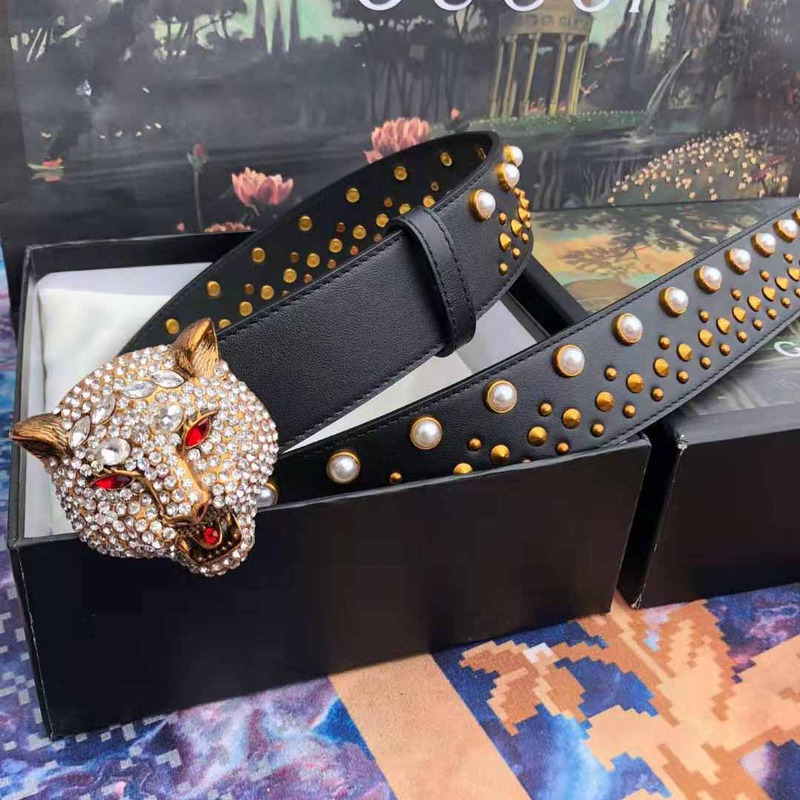 G*u*i leather belt with tiger buckle