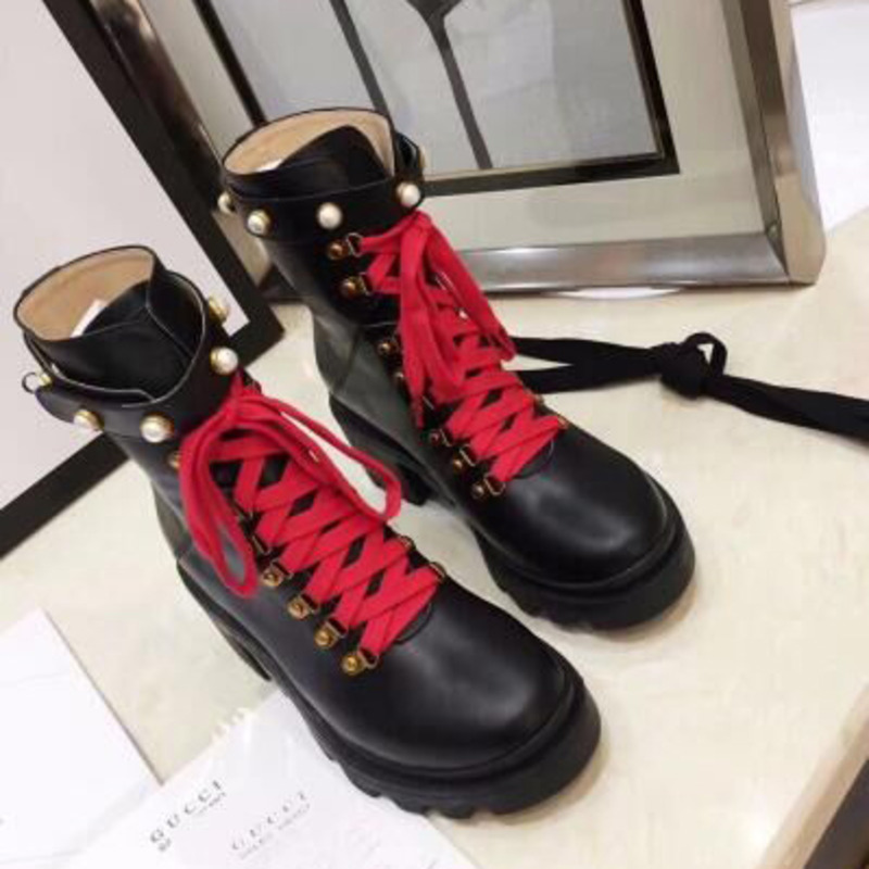 G*u*i black leather boots
