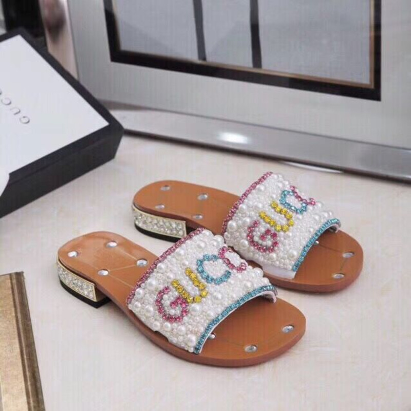 G*u*i slides with pearl